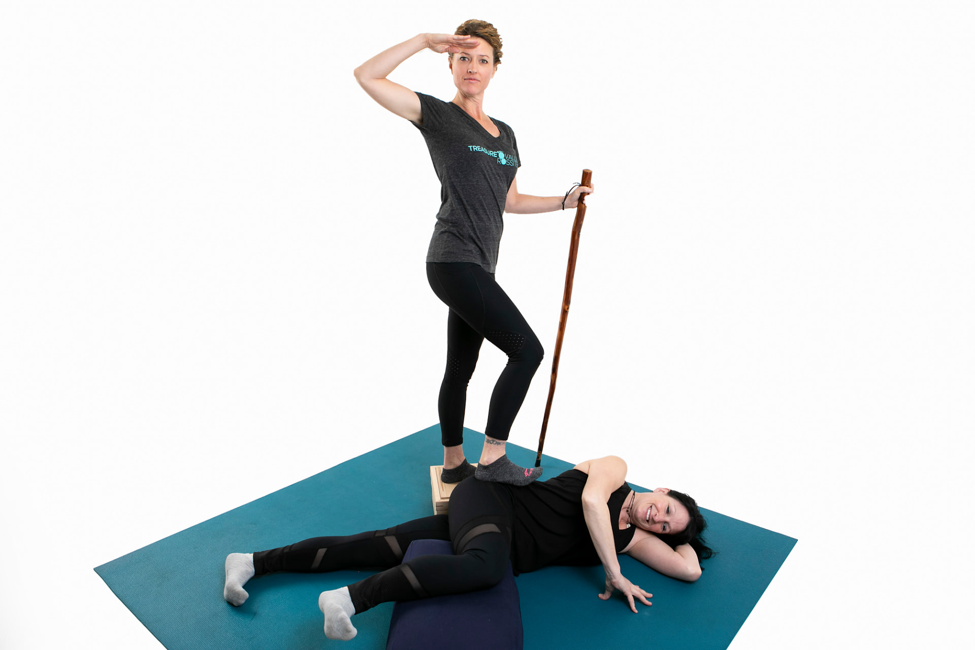 A Treasure Valley Rossiter coach guiding a client through an active hip movement during a session